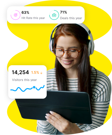 Sales team member reviewing hit rate and deal reporting