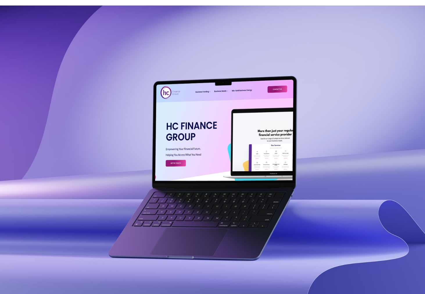 HC Finance Group website shown on a laptop