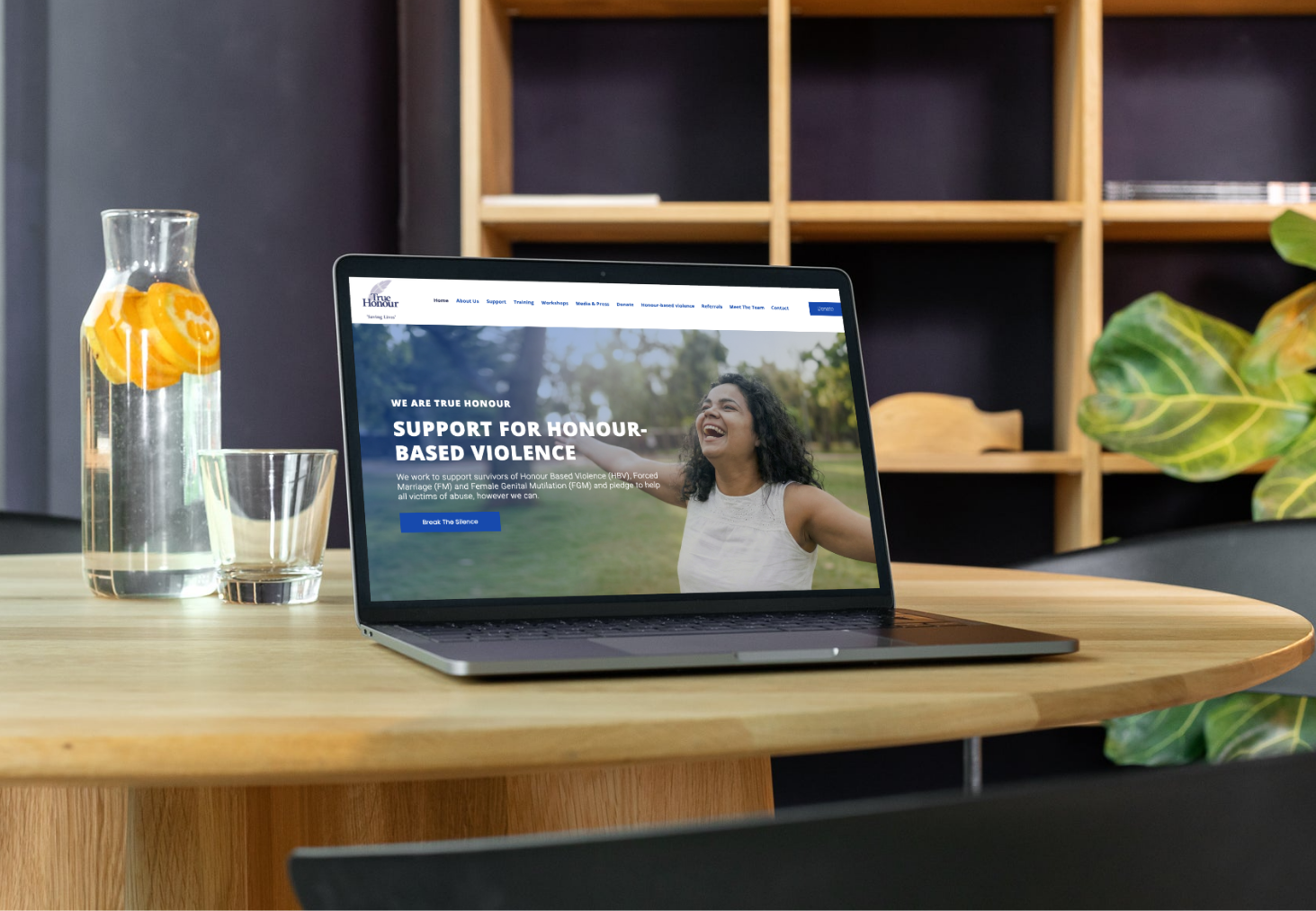 True Honour website shown on a laptop